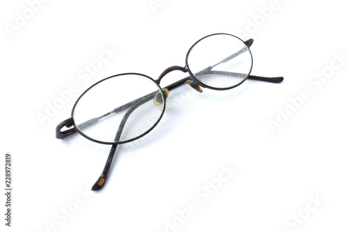 Old glasses with simple design isolated on white background