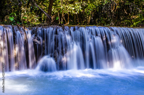 Landscape photo, Huay Mae Kamin Waterfall,Amazing waterfall in wonderful autumn forest, beautiful waterfall in rainforest at Kanchanaburi province, Thailand © NARANAT STUDIO