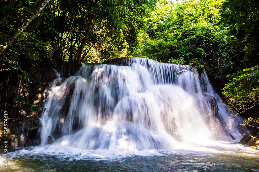 Landscape photo, Huay Mae Kamin Waterfall,Amazing waterfall in wonderful autumn forest, beautiful waterfall in rainforest at Kanchanaburi province, Thailand