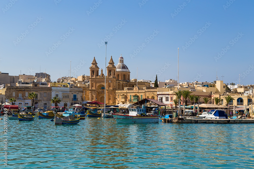 Marsaxlokk, Malta. Scenic view of the city and the cathedral