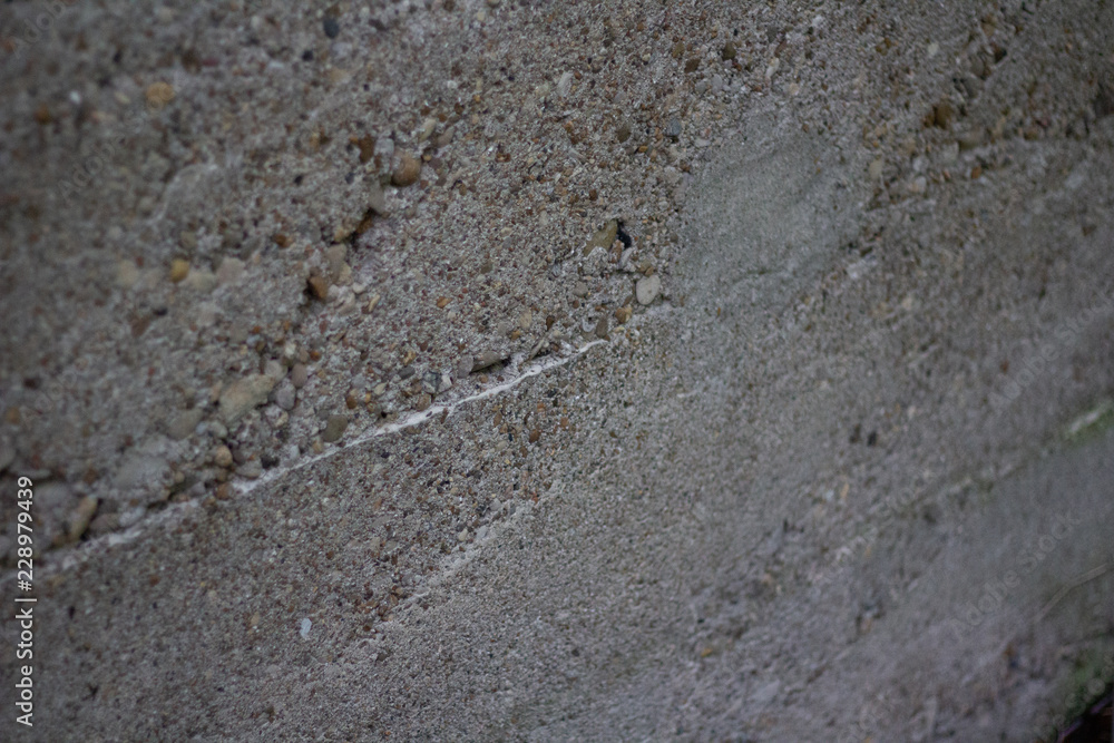 Close up of the texture of an aged cement wall