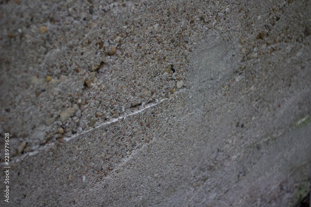 Close up of the texture of an aged cement wall