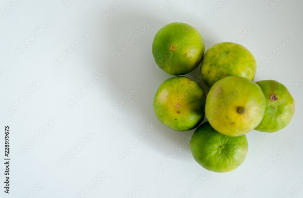 Healthy Fresh Limes Isolated On A White Background Healthy Fresh Limes Isolated On A White Background