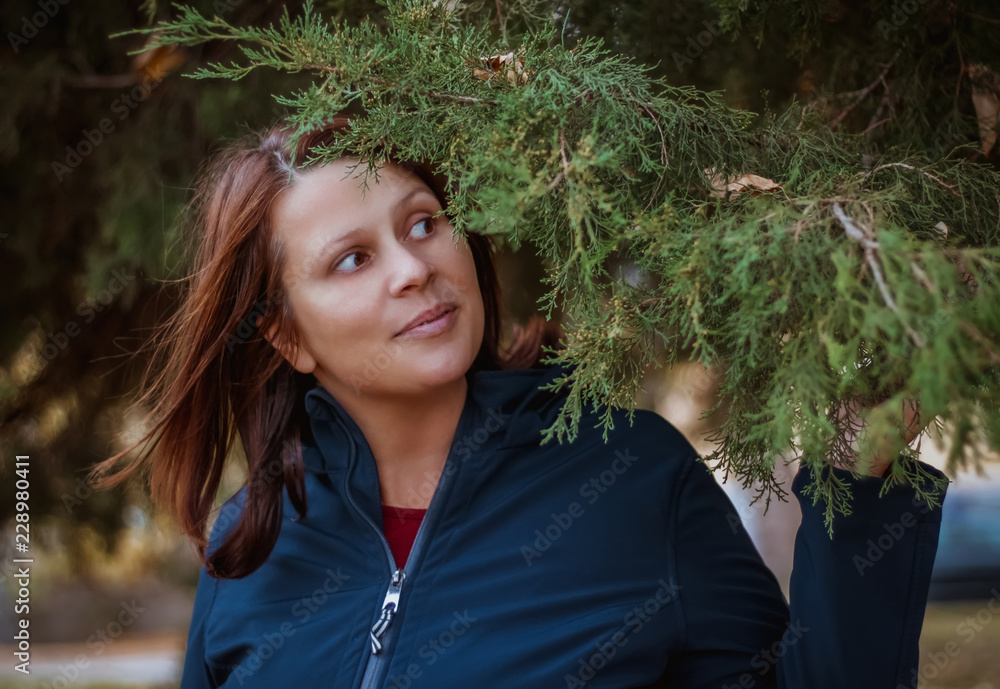 Woman in autumn scenery