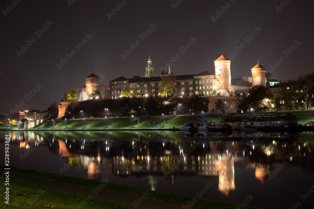 Wawel Castle in the night, reflection, Krakow