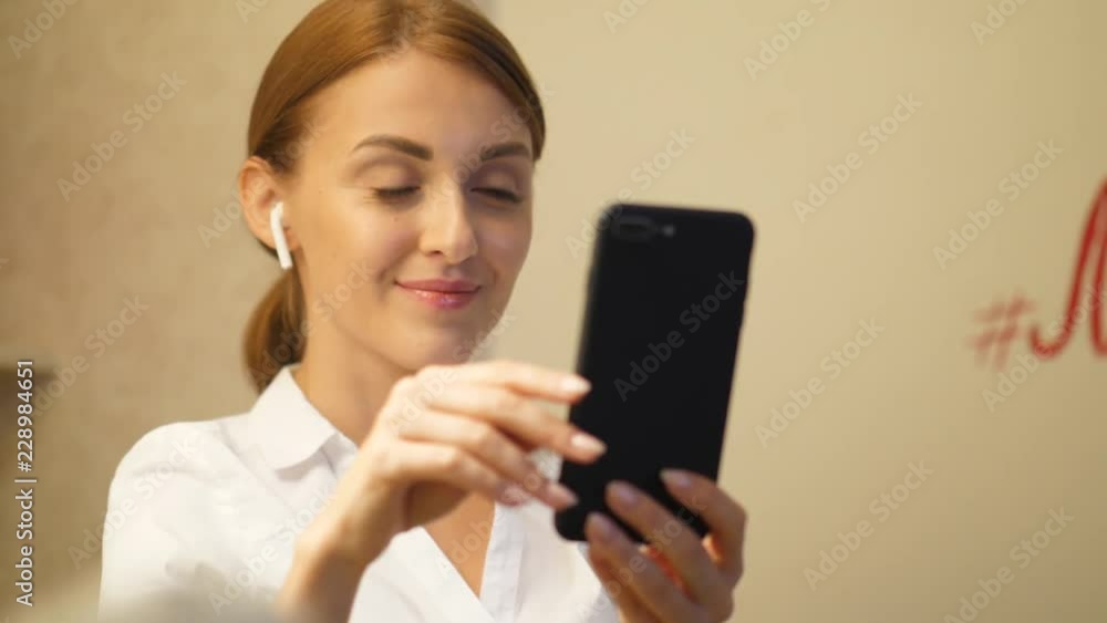 Portrait of young woman make video call with smartphone Portrait of young woman make video call with smartphone