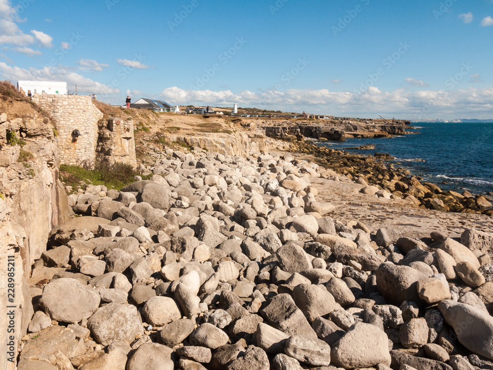 texture of grey rocks on coast beach landscape background nature
