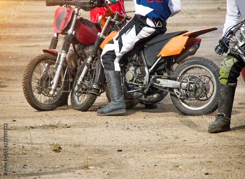 Competitions on motoball, players are furiously fighting for the ball, playing football on motorcycles, motor bicycle