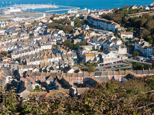 chesil beach from isle of portland beach view england summer landscape buildings