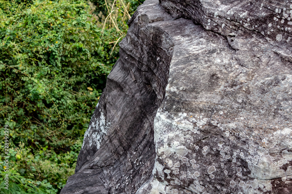 Looking off the mountain side at Phu Foi Lom at eroded rock.
