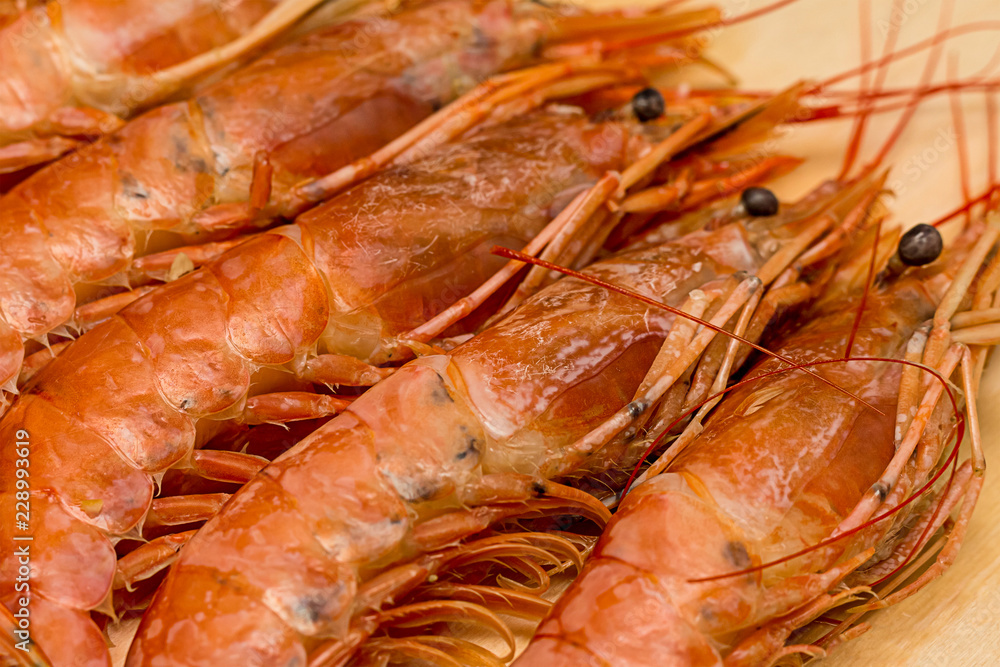 set of langoustine morselic delicacies in shell large with head and black eyes close-up of dietary dish set of langoustine morselic delicacies in shell large with head and black eyes close-up of dietary dish