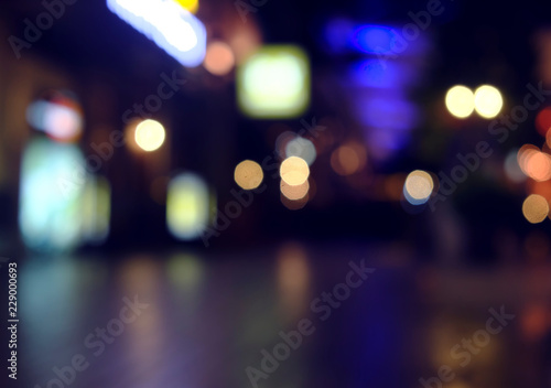 defocused bokeh light, abstract background at night photo © wedninth
