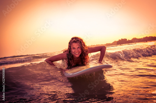 Beautiful surfer on sunset at  Weligama beach , Sri Lanka. © Aleksandar Todorovic