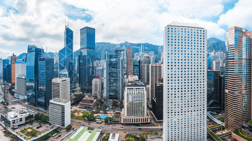 Panorama view of Hong Kong skylines with beautiful blue sky © YiuCheung