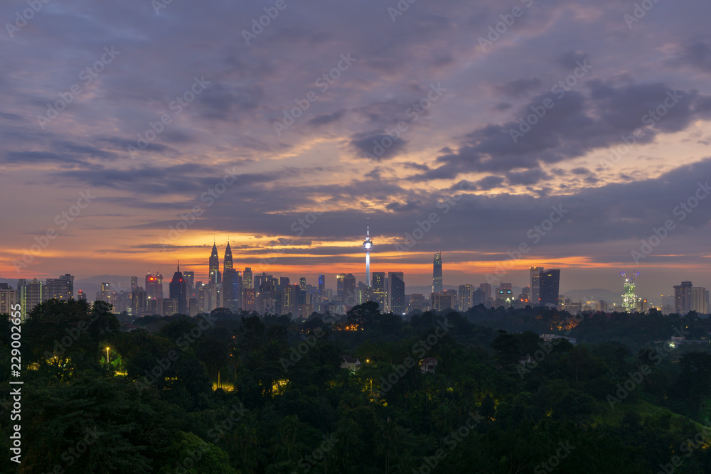 View of cloudy sunrise over downtown Kuala Lumpur, Malaysia	