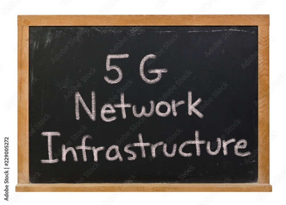 5G network infrastructure written in white chalk on a black chalkboard isolated on white 5G network infrastructure written in white chalk on a black chalkboard isolated on white