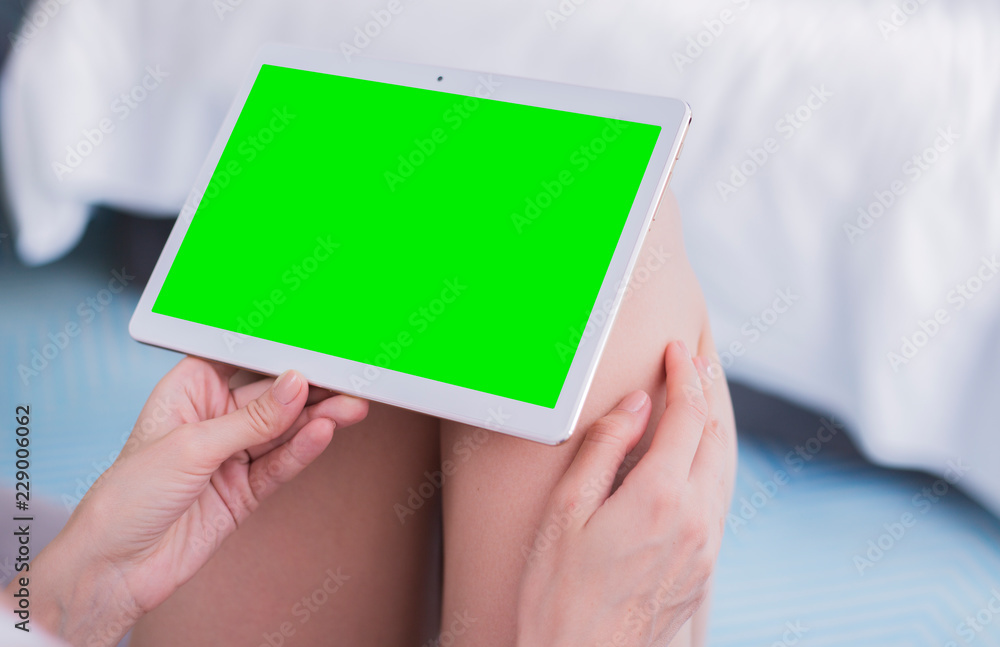 woman is relaxing on comfortable couch and using laptop at home woman is relaxing on comfortable couch and using laptop at home