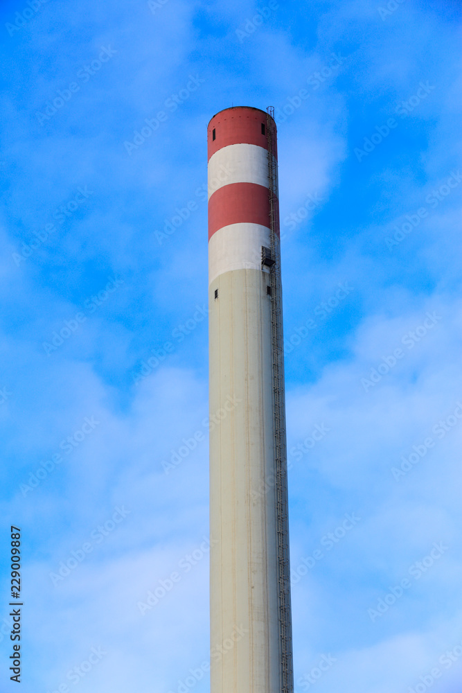 Tall white and red chimney