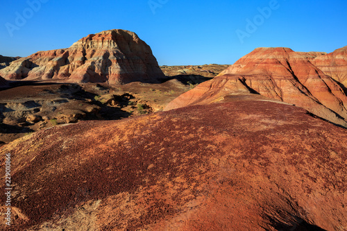 Rainbow City  Wucai Cheng. Colorful Red  Pink  Orange and Yellow landforms in a remote desert area of Fuyun County - Altay Perfecture  Xinjiang Province Uygur Autonomous Region  China. Exotic Scenery