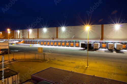 gates for trucks on a warehouse at night
