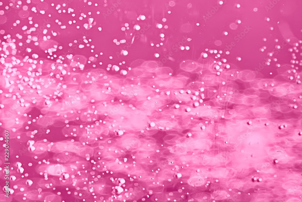 pink water bubbles background / fresh summer background pink air bubbles in water pink water bubbles background / fresh summer background pink air bubbles in water