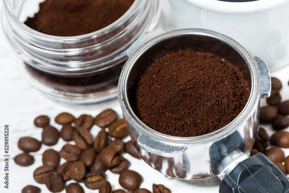 holder with aroma ground coffee on table, top view holder with aroma ground coffee on table, top view