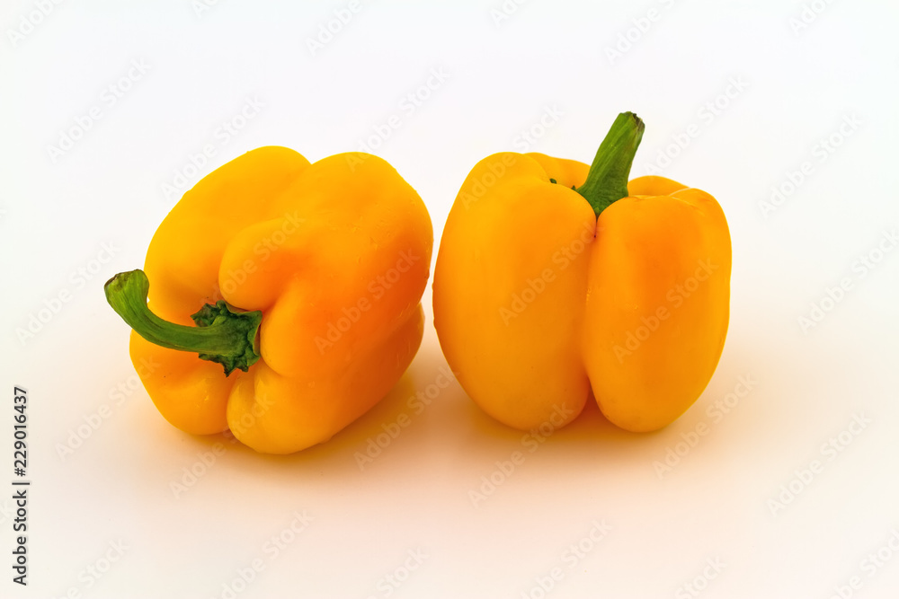 Colorful of fresh yellow sweet bell pepper (capsicum) stack on white background Colorful of fresh yellow sweet bell pepper (capsicum) stack on white background