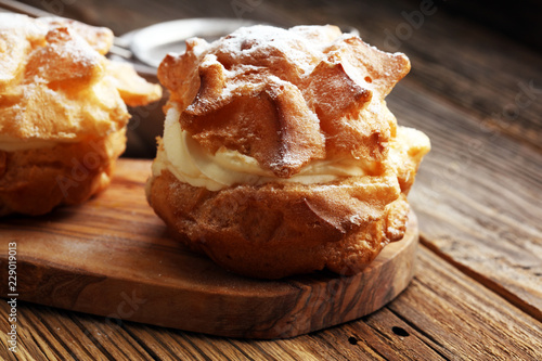 Obraz na plátne cream puffs. homemade pastry cream puff.