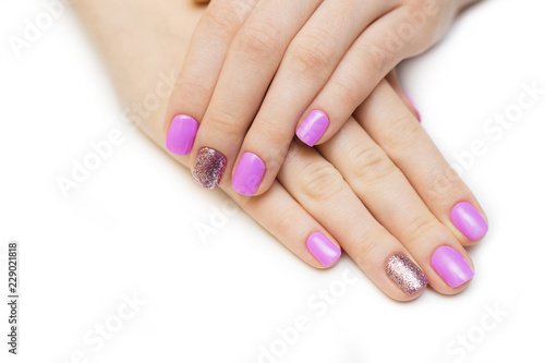 Nail varnishing in white color. Manicure, pedicure beauty salon concept. Empty place for text or logo.