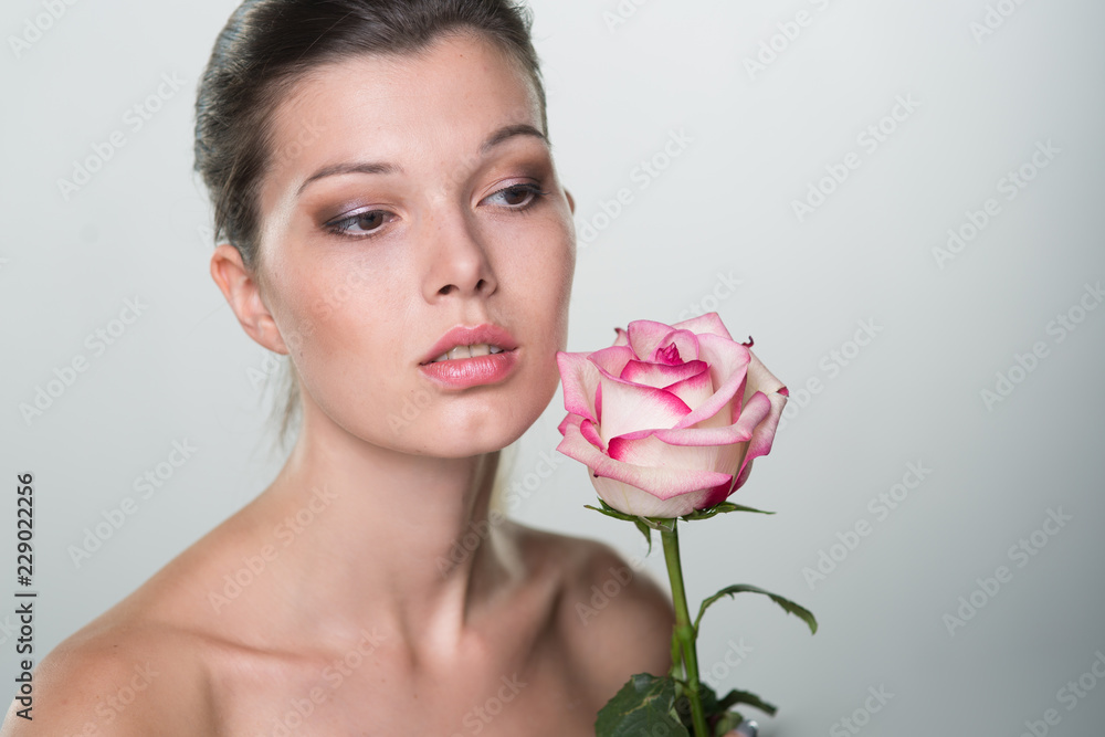 beautiful young woman with rose beautiful young woman with rose