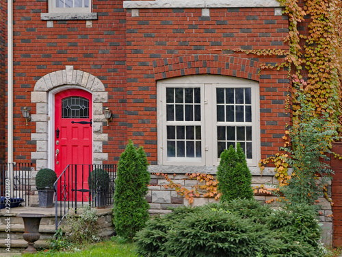 house front door with vines in fall colors