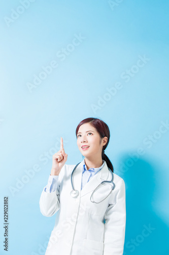 woman doctor pointing something