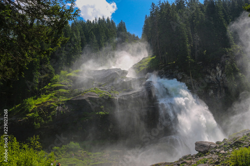 View Alpine inspiring Krimml waterfall in mountains in summer day. Trekking in National park Hohe Tauern, Austria