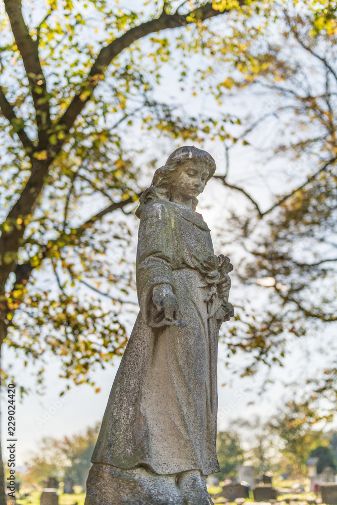 graveyard statue of girl