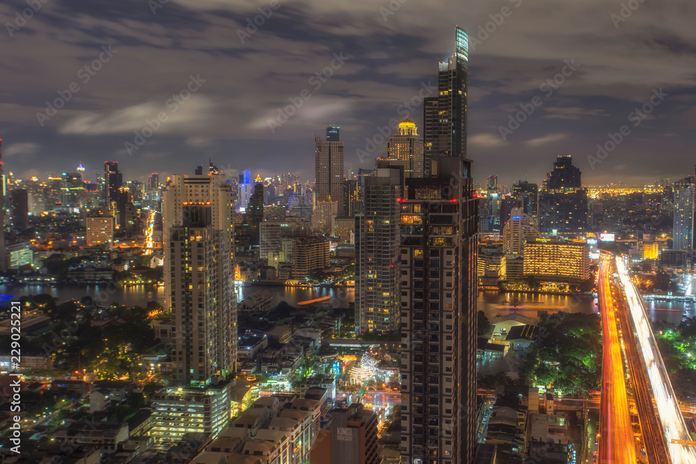 Bangkok city night view point from rooftop of building in the Bangkok city downtown at Krungtonburi Road,Bangkok,Thailand