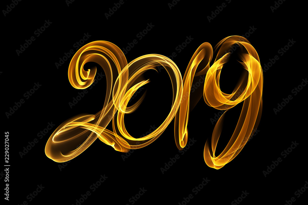 Happy new year 2019 isolated numbers lettering written with fire flame or smoke on black background Happy new year 2019 isolated numbers lettering written with fire flame or smoke on black background