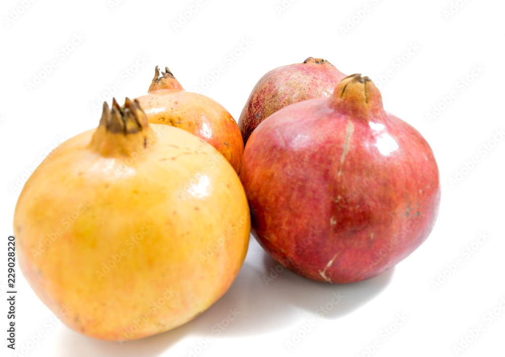 Whole pomegranate isolated on white background Whole pomegranate isolated on white background