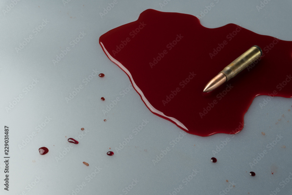 crime scene concept, close up of a gun bullet in pool of blood Stock ...