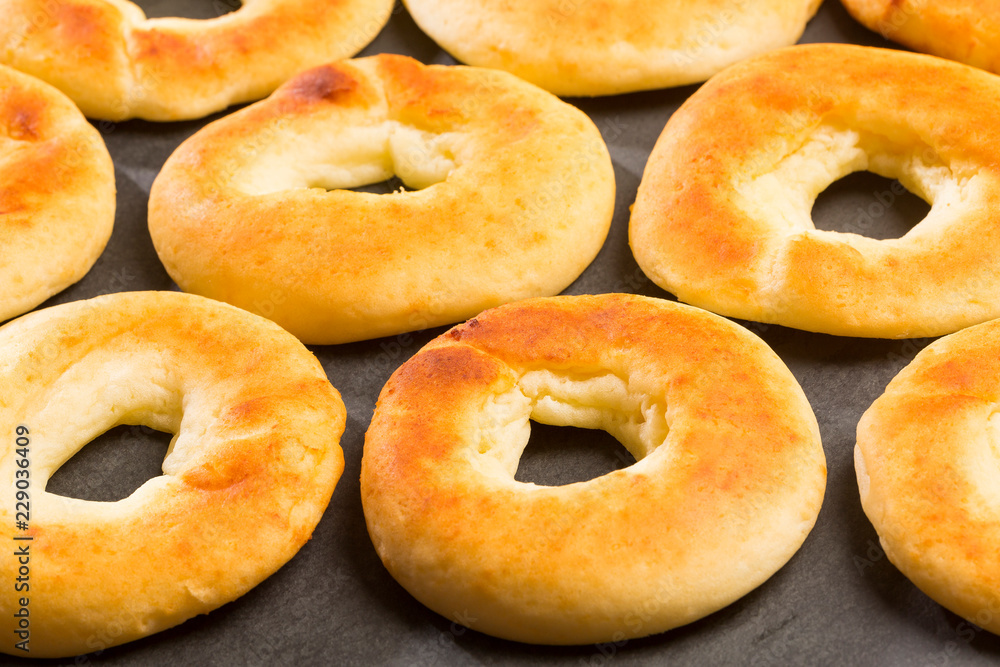 Pandequeso traditional Colombian food. Wood background Pandequeso traditional Colombian food. Wood background
