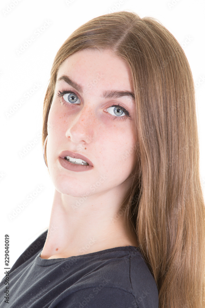Portrait of a beautiful young woman long hairs looking at camera and smiling isolated on white background Portrait of a beautiful young woman long hairs looking at camera and smiling isolated on white background