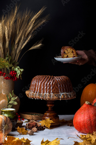 homemade pumpkin bundt cake with creamy frosting photo