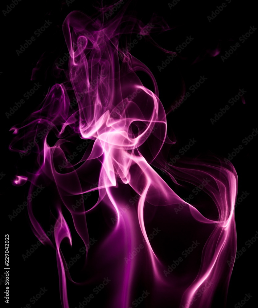 Fototapeta premium Purple smoke on black background