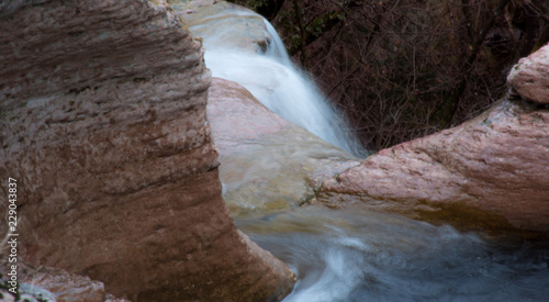 Coi de Pera, Belluno. Sedimentazione carsica, antica cava con cascata. photo