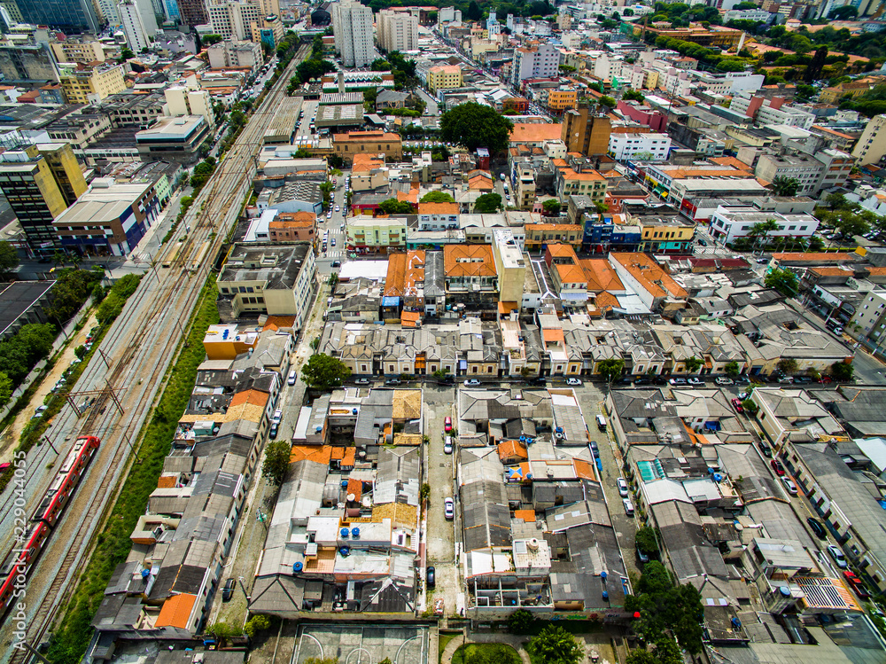  Great cities, great avenues, houses and buildings. Light district (Bairro da Luz), Sao Paulo Brazil, South America. Rail and subway trains. Aerial view of State Avenue next to the Tamanduatei River 