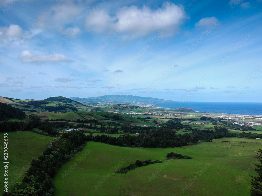 Aerial view green fields in the island of São Miguel. Azores, Portugal. Drone Shot