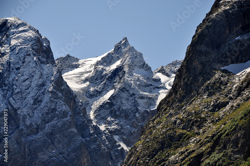 Closeup mountains scenes in national park Dombai  Caucasus  Russia  Europe. Sunshine weather and blue sky  summer day