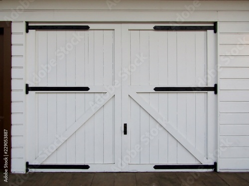 White wooden barn doors with black hinges