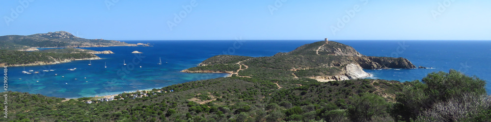 Great panoramic view of the blue bay and rugged coastline at Capo Malfatano, Sardinia, Italy