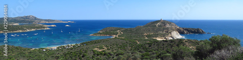 Great panoramic view of the blue bay and rugged coastline at Capo Malfatano, Sardinia, Italy