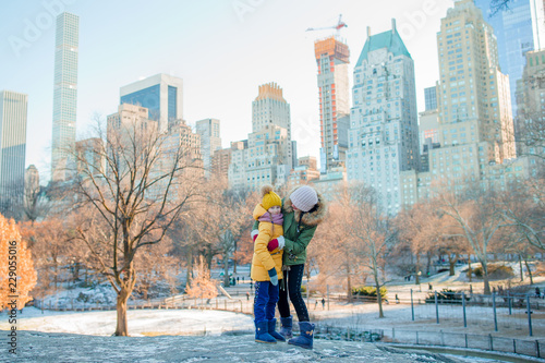 Happy mother and little girl on Manhattan, New York City, New York, USA.